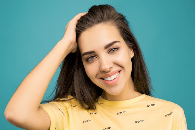 woman wearing yellow shirt